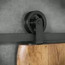 Sliding door system attachable to the door leaf from above, for single-leaf doors up to 130 kg, fixed to the wall