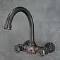 Grifo de baño clásico de pared fabricado en latón, color negro, altura 24 cm, longitud del caño 19 cm