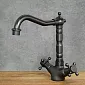 Aixeta de lavabo estil retro de peu feta de llautó, color negre, alçada 23,5 cm, longitud del broc 18,5 cm