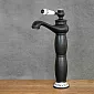 Torneira para lavatório estilo retro, em latão com elementos cerâmicos, cor preto e branco, altura 31 cm, comprimento do bico 11,5 cm