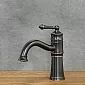 Grifo de lavabo estilo retro fabricado en latón en color negro, altura 23,5 cms, largo caño 15 cms