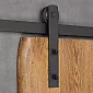 Sistema de puerta corredera de acero, para puertas de una hoja de hasta 130 kg, negro, montado en la pared