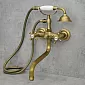 Mitigeur bain-douche mural en laiton, hauteur 39 cm, longueur bec 23 cm, couleur dorée