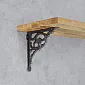 Suport decoratiu per a prestatge fet de ferro colat, profunditat 26 cm, alçada 24,5 cm, joc de 2 peces.