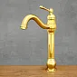 Mitigeur de lavabo autoportant en laiton satiné doré