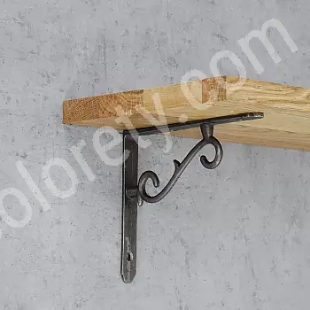 Čuguna plauktu balsts, kronšteins, augstums 18 cm, garums 13,5 cm, S-veida izskats, komplektā 2 gab.