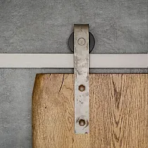 Old-looking sliding door system kit made of raw silver colour steel with rust traces, for one leaf doors up to 130 kg, mounting to wall, total length 200 cm